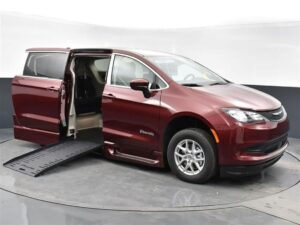 Red Chrysler Voyager with BraunAbility Side Entry Automatic Fold Out conversion
