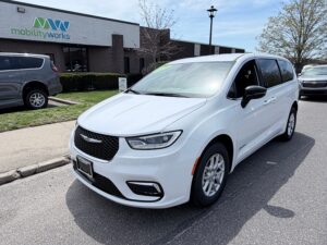 White Chrysler Pacifica with Driverge Side Entry Automatic Fold Out conversion
