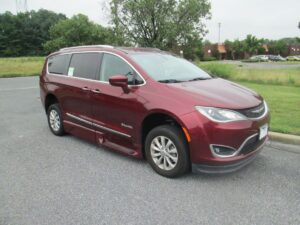 Red Chrysler Pacifica with BraunAbility Side Entry Automatic Fold Out conversion