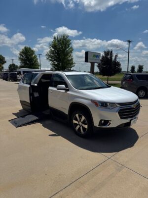 White Chevrolet Traverse with BraunAbility Side Entry Automatic In Floor conversion