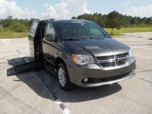 Grey Dodge Grand Caravan with BraunAbility Side Entry Automatic Fold Out conversion