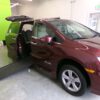 Red Honda Odyssey with BraunAbility Side Entry Automatic In Floor conversion