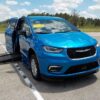 Blue Chrysler Pacifica with BraunAbility Side Entry Automatic Fold Out conversion