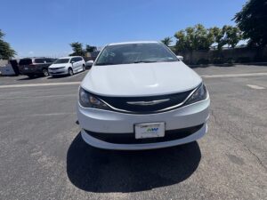 White Chrysler Voyager with Vantage Mobility Side Entry Manual In Floor conversion