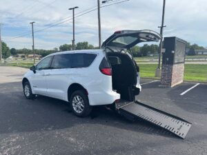 White Chrysler Voyager with BraunAbility Rear Entry Manual Fold Out conversion
