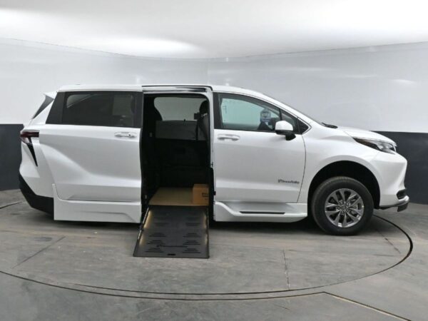 White Toyota Sienna with BraunAbility Side Entry Automatic Fold Out conversion