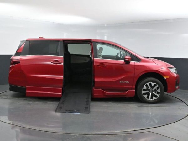 Red Honda Odyssey with BraunAbility Side Entry Automatic In Floor conversion