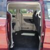 Red Chrysler Pacifica with BraunAbility Side Entry Automatic Fold Out conversion