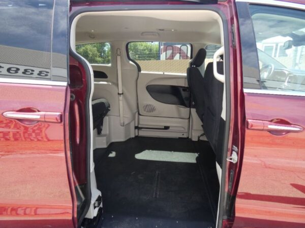 Red Chrysler Pacifica with BraunAbility Side Entry Automatic Fold Out conversion