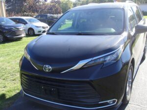 Black Toyota Sienna with Driverge Rear Entry Manual Fold Out conversion