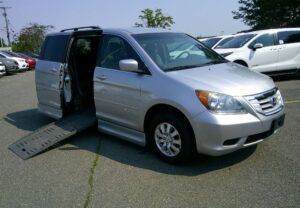 Silver Honda Odyssey with BraunAbility Side Entry Automatic Fold Out conversion