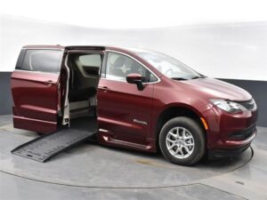 Red Chrysler Voyager with BraunAbility Side Entry Automatic Fold Out conversion