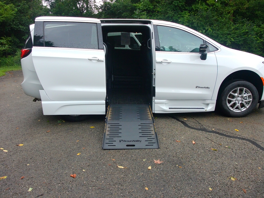 White Chrysler Pacifica with BraunAbility Side Entry Automatic Fold Out conversion