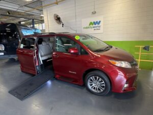Red Toyota Sienna with BraunAbility Side Entry Automatic In Floor conversion