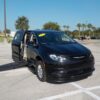 Black Chrysler Voyager with BraunAbility Side Entry Automatic Fold Out conversion