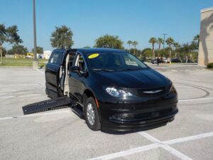 Black Chrysler Voyager with BraunAbility Side Entry Automatic Fold Out conversion