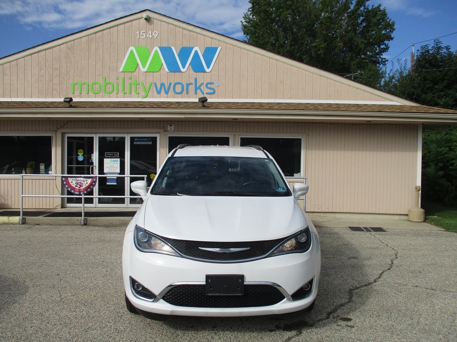 White Chrysler Pacifica with Vantage Mobility Side Entry Automatic In Floor conversion