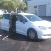 White Chrysler Voyager with Driverge Side Entry Automatic Fold Out conversion