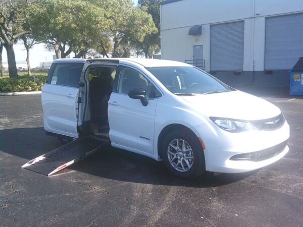 White Chrysler Voyager with Driverge Side Entry Automatic Fold Out conversion