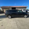 Black Chrysler Pacifica with Driverge Rear Entry Manual Fold Out conversion