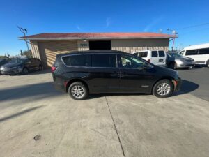 Black Chrysler Pacifica with Driverge Rear Entry Manual Fold Out conversion