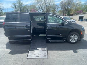 Black Chrysler Voyager with BraunAbility Side Entry Automatic Fold Out conversion