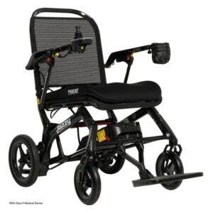 The Jazzy® Ultra Light Travel Power Wheelchair, available in black, resembles a lightweight mobility scooter and includes a mesh backrest and padded seat. It is equipped with four wheels and has a joystick controller on the armrest, along with a small storage pouch on the opposite side for added convenience.