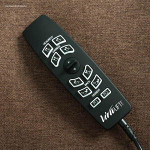 A black remote control for the VivaLift! Metro 2 Lift Chair, featuring labeled buttons for headrest, lumbar, back, and legrest adjustments, rests on a brown fabric surface.