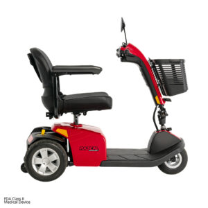 The Conquest 3-Wheel Scooter, shown in profile on a white background, is red with a black seat and armrests, front basket, and three wheels—offering portability comparable to a lightweight power wheelchair.