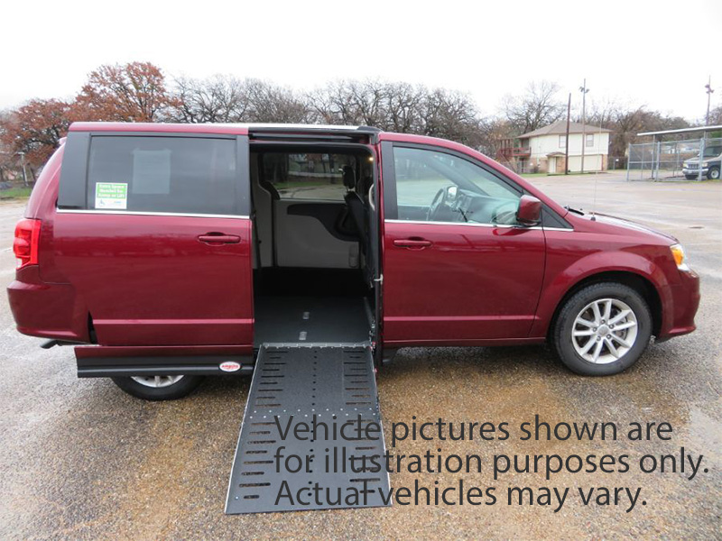 Red Dodge Grand Caravan with Adaptive Vans Side Entry Automatic Fold Out conversion