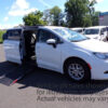 Black Chrysler Voyager with Adaptive Vans Side Entry Automatic Fold Out conversion