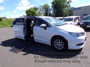 Black Chrysler Voyager with Adaptive Vans Side Entry Automatic Fold Out conversion