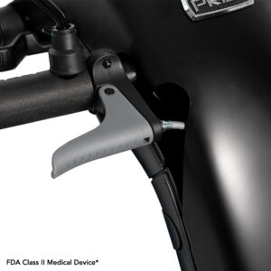 Close-up of a scooter handlebar with a grey brake lever and a small FDA Class II Medical Device label at the bottom left corner.